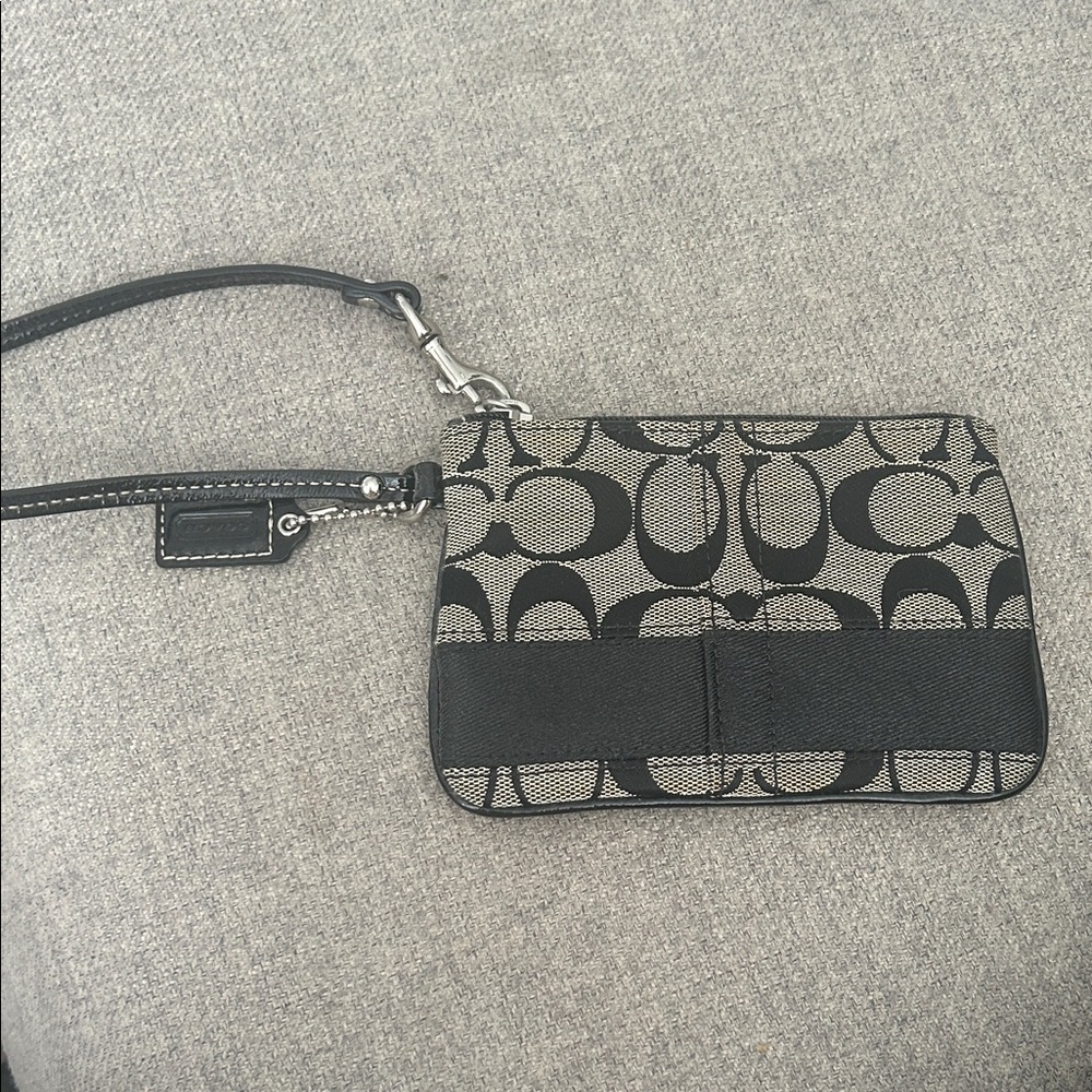 Coach Black and Cream Patterned Wristlet